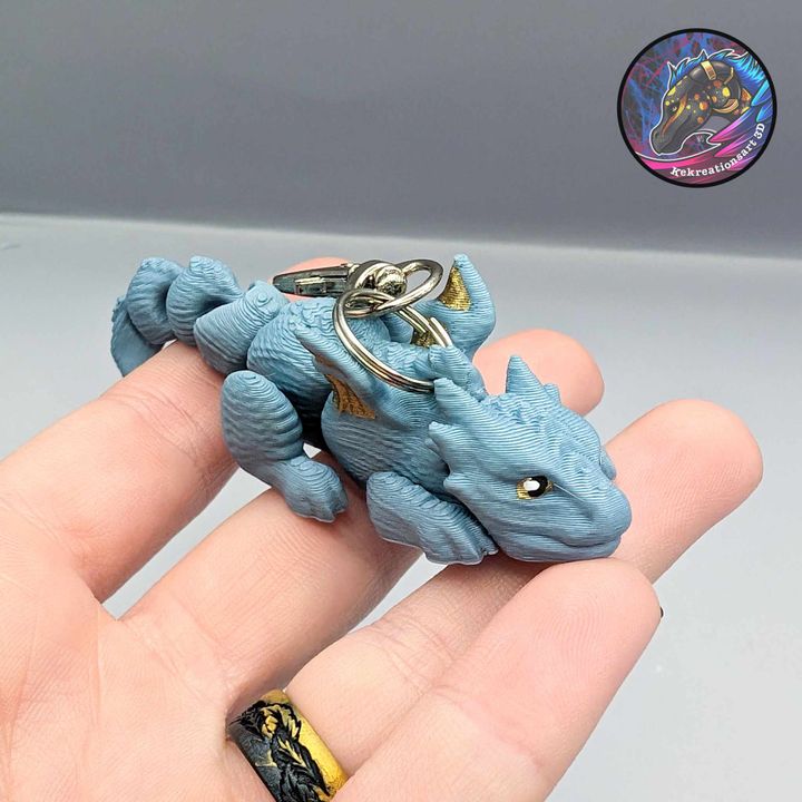 Kirsten M 蓬头垢面的小龙软胶钥匙扣-3D合纵社-3D打印模型STL格式3mf格式免费下载！